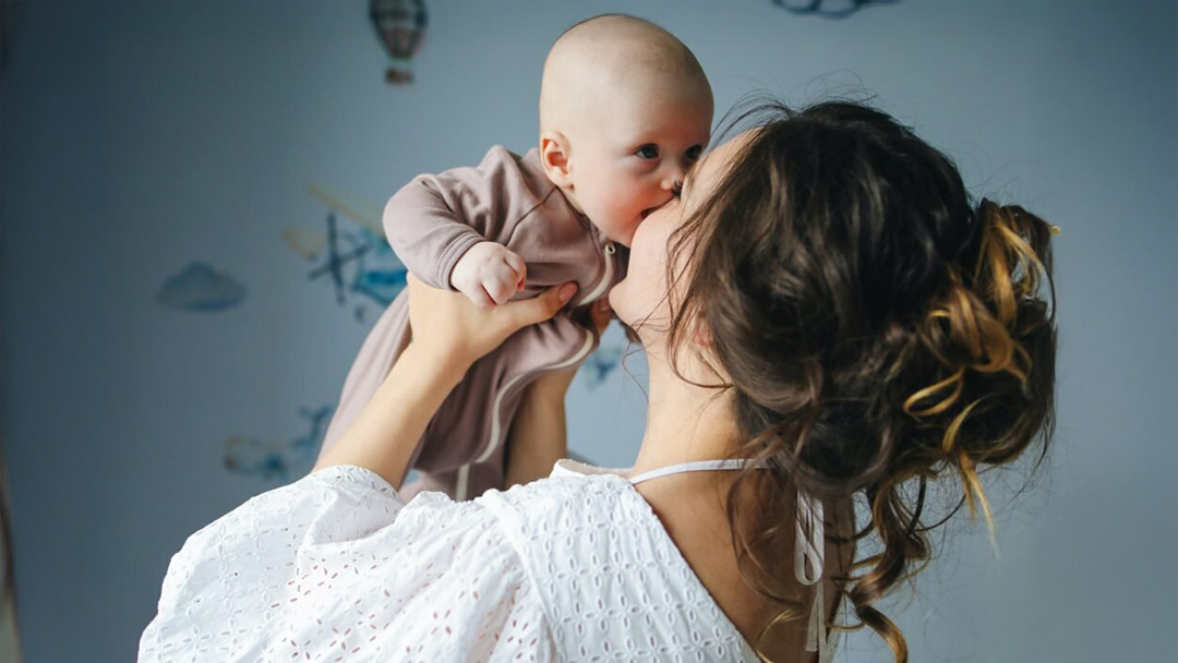 MF_WhiteWomanWithBabyInAir1080x600 - Pikes Peak Citizens for Life